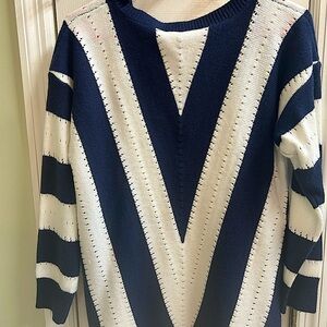 Women's size medium, navy blue and white sweater top. T"op is in like new con'd.